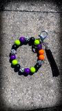 🎃💀🖤 Spooky Skull Halloween Silicone Beaded Wristlet – Black, Purple, Green & Orange